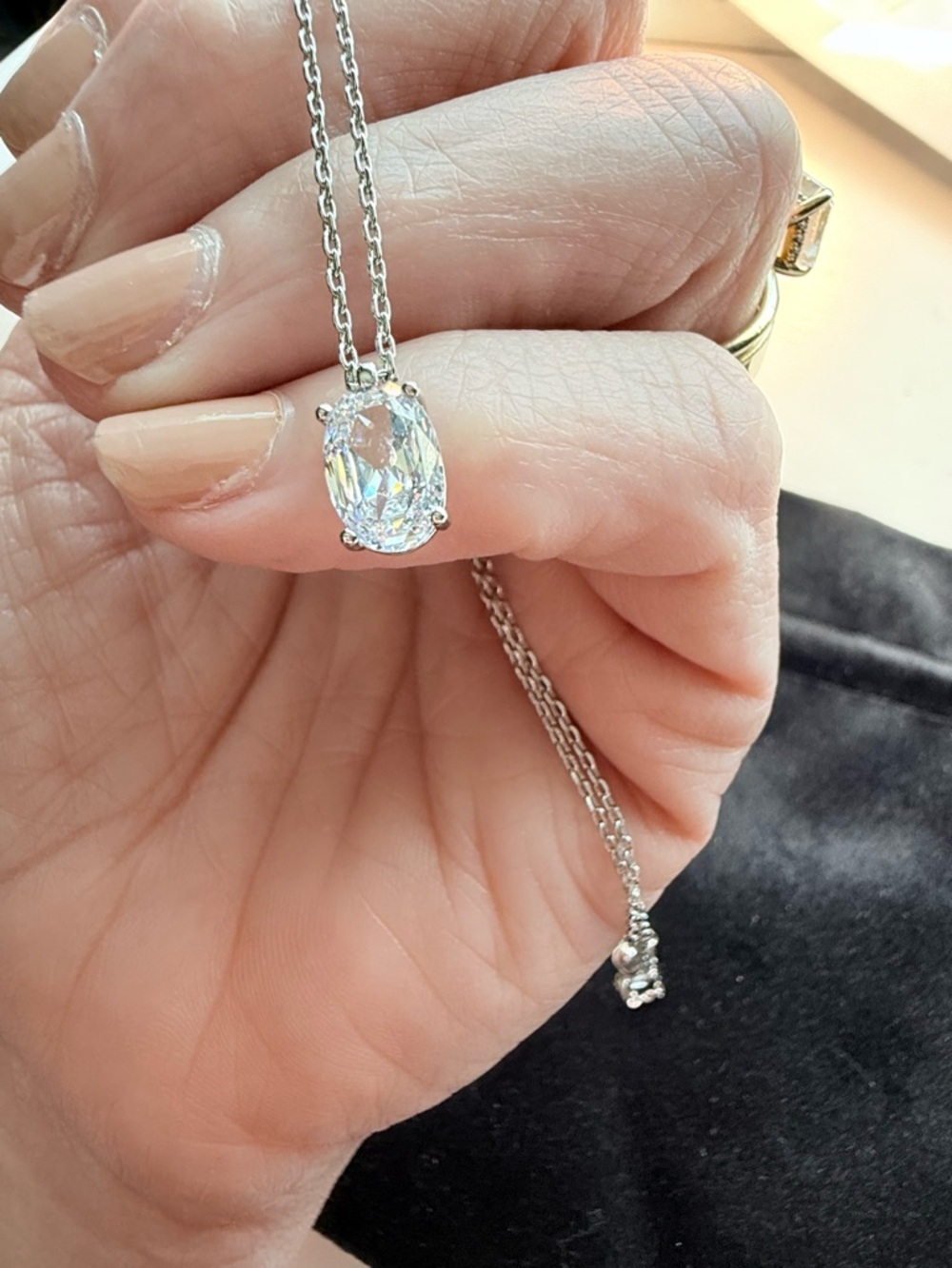 Elegant Adjustable Silver Necklace with Oval Crystal Pendant